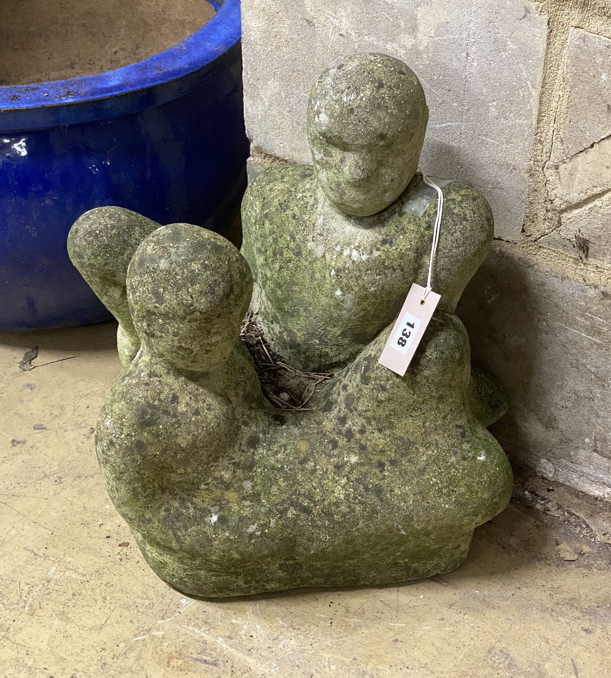 A reconstituted stone figural garden ornament, height 40cm